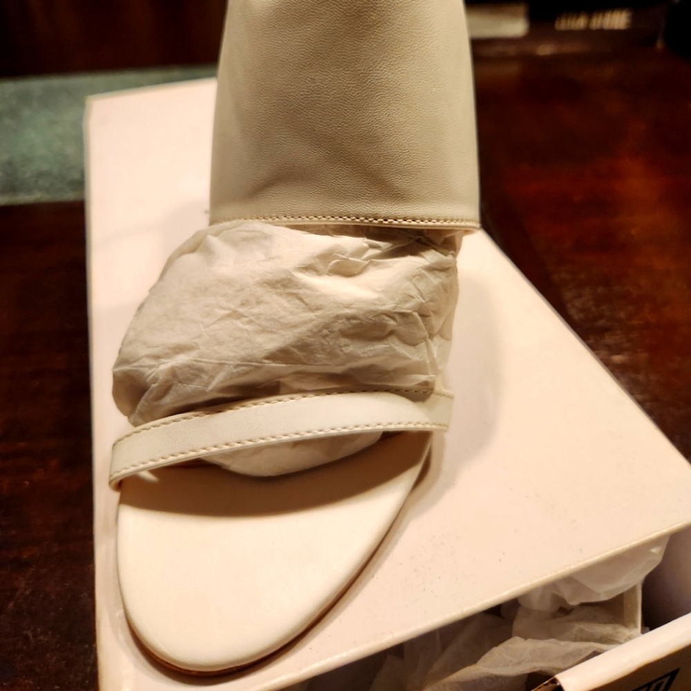 Brand new white sandals.